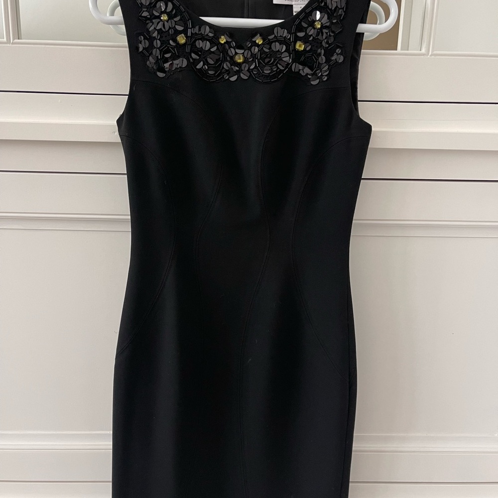 Diane Von Furstenberg Black Dress with beaded neck. Size 4.